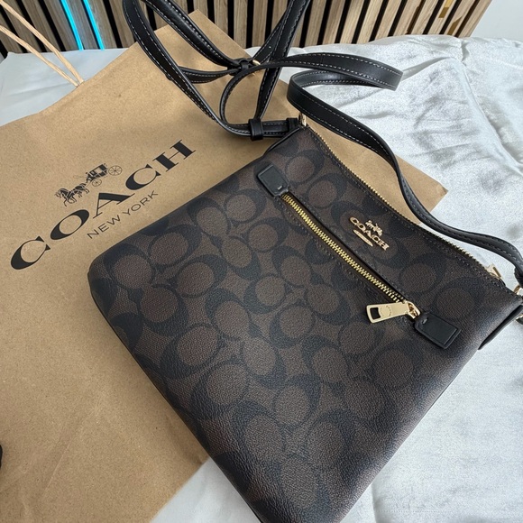 Coach Handbags - WOW 🌼 COACH 🤎 Rowan File Bag In Signature Canvas Handbag -Black/Gold/Brown -Mint